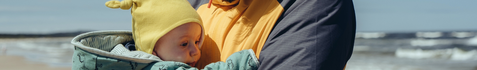 Small baby being held