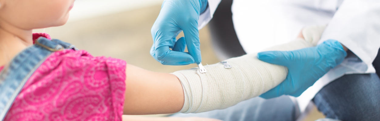 Child with serious arm injury