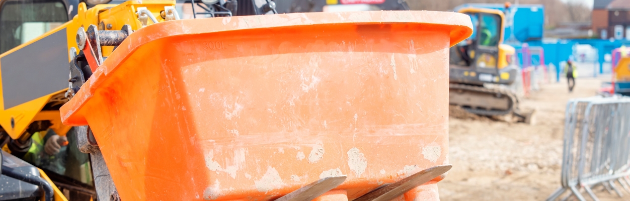 Fork lift truck carrying plastic trough